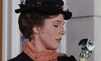 Gif of the character Mary Poppins pinching shut the mouth of her talking umbrella handle and telling it, 