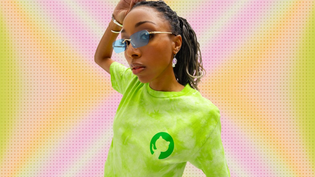 An image of a woman wearing a tie dye tee shirt.